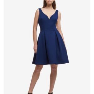 Beautiful deep midnight blue v neck and v back dress. NWT Dkny